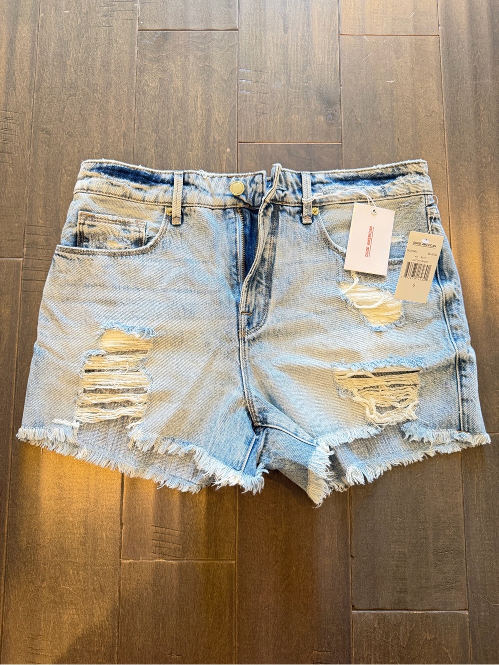 Good American Light Blue Distressed Denim Cutoff Shorts
